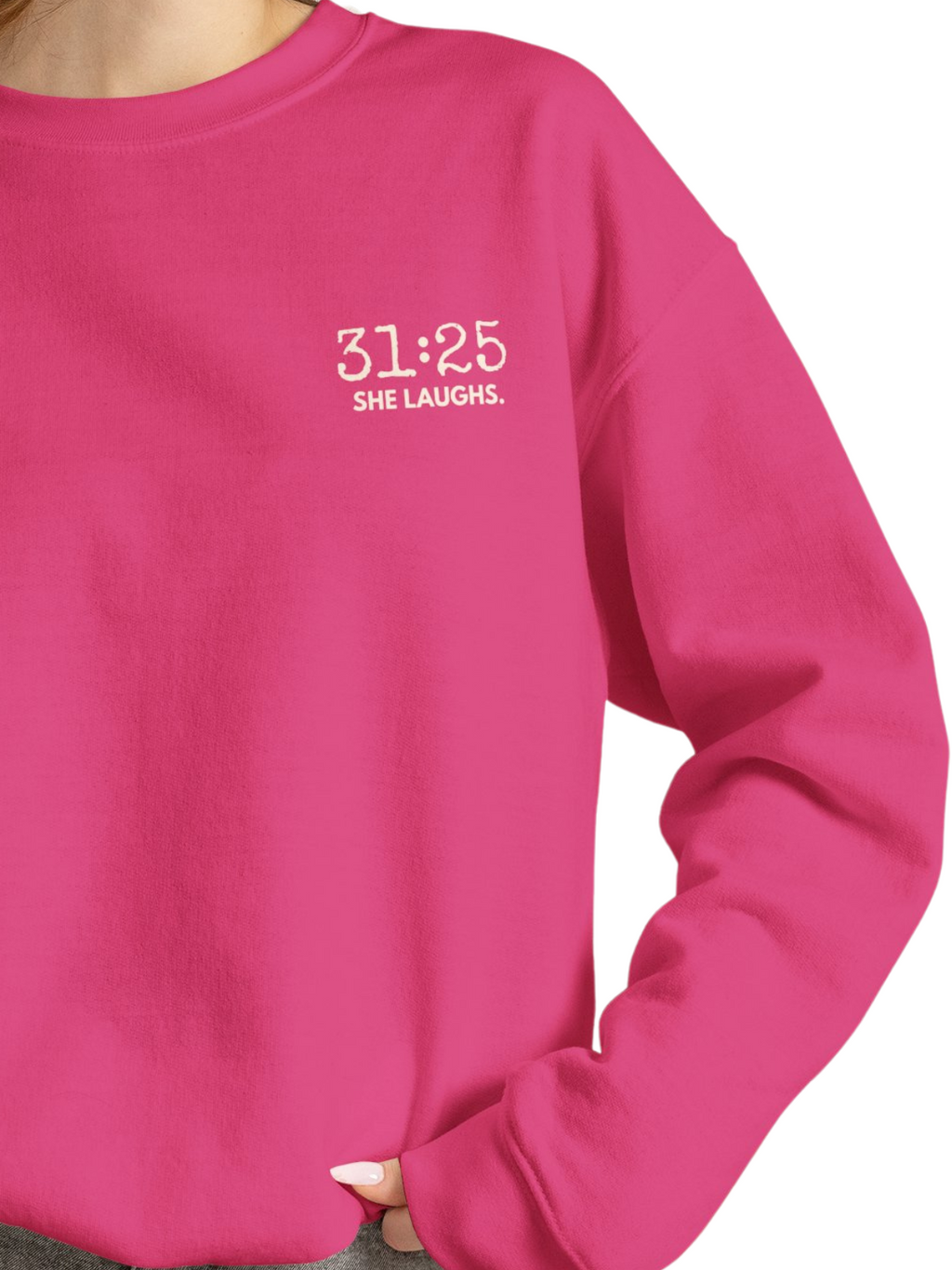 Close-up of the white 31:25 left-chest print on a Heliconia pink crewneck sweatshirt, showing the minimal lettering and soft fabric.